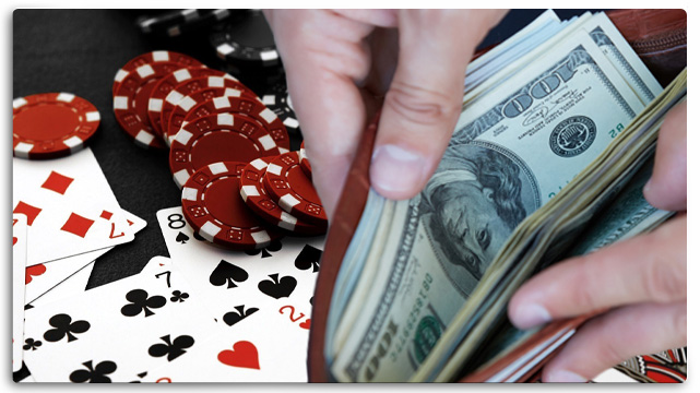 Poker Cards, Poker Chips on Poker Table, Hand Opening Wallet with Money