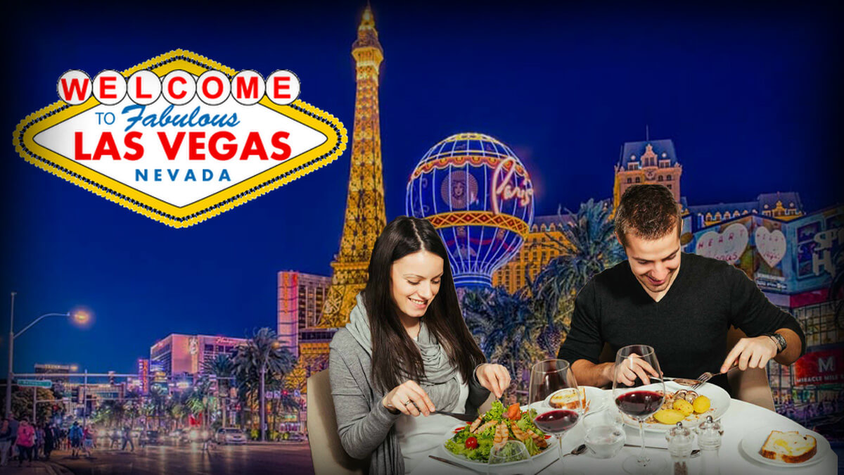 Couple Having Dinner, Las Vegas Strip in Background, Welcome to Las Vegas Sign