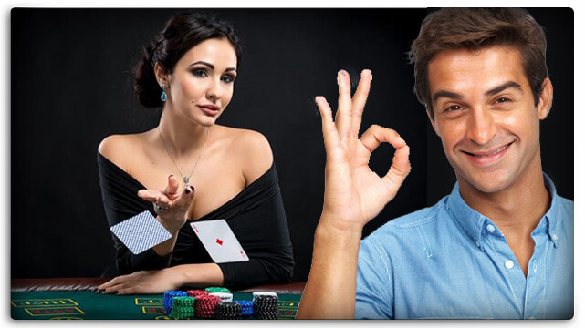 Woman Throwing Poker Cards on Table, Man Smiling, Signaling OK