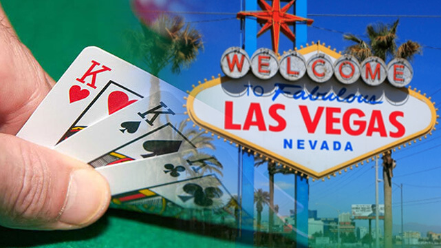 Hand Holding Three Poker Cards, Welcome to Las Vegas Sign