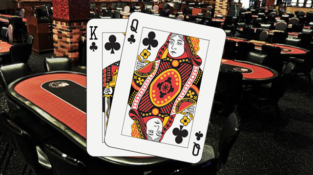 Poker Table in Casino, King and Queen Poker Card