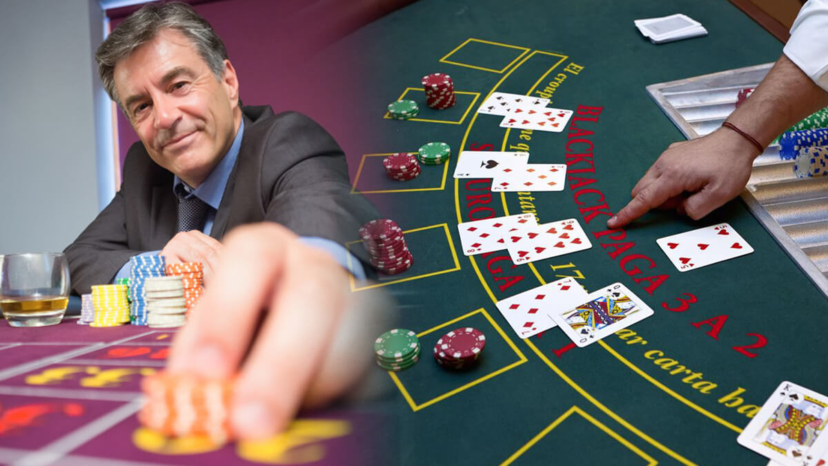 Guy Reaching Over to Casino Chip, Dealer Pointing to Blackjack Card