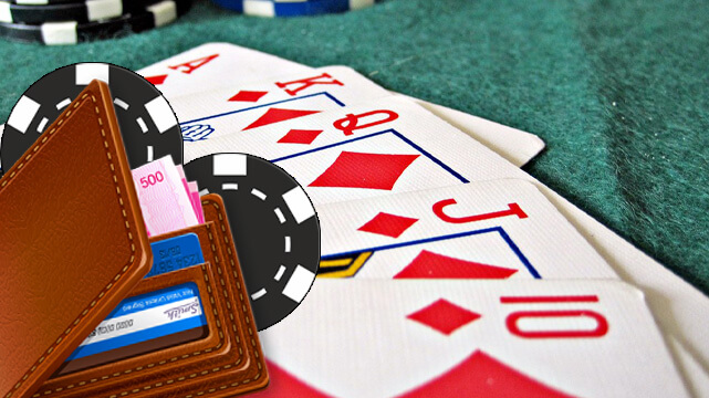 Poker Cards on Table, Wallet with Money and Credit Cards, Casino Chips