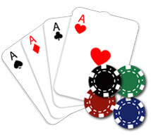 Four Poker Cards Spread Out with Colored Casino Chips on the Side