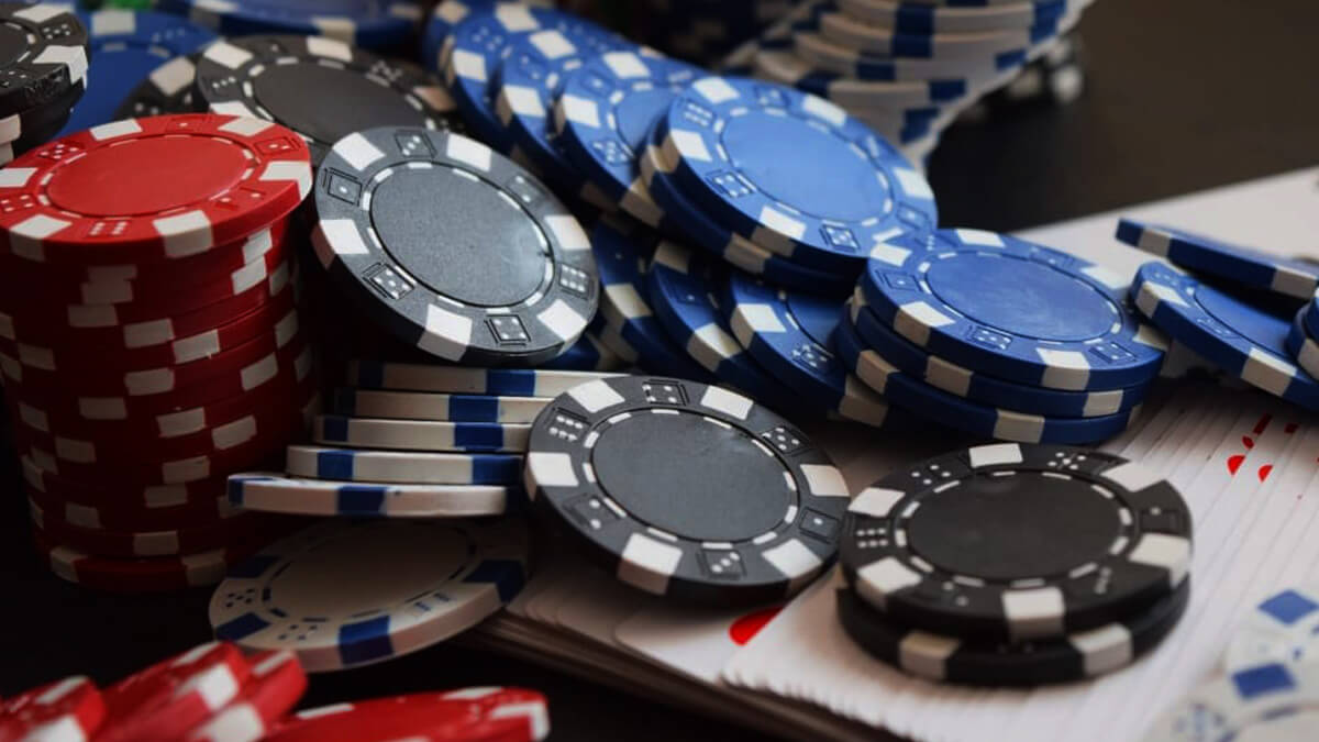 Casino Chips in a Pile, Poker Cards