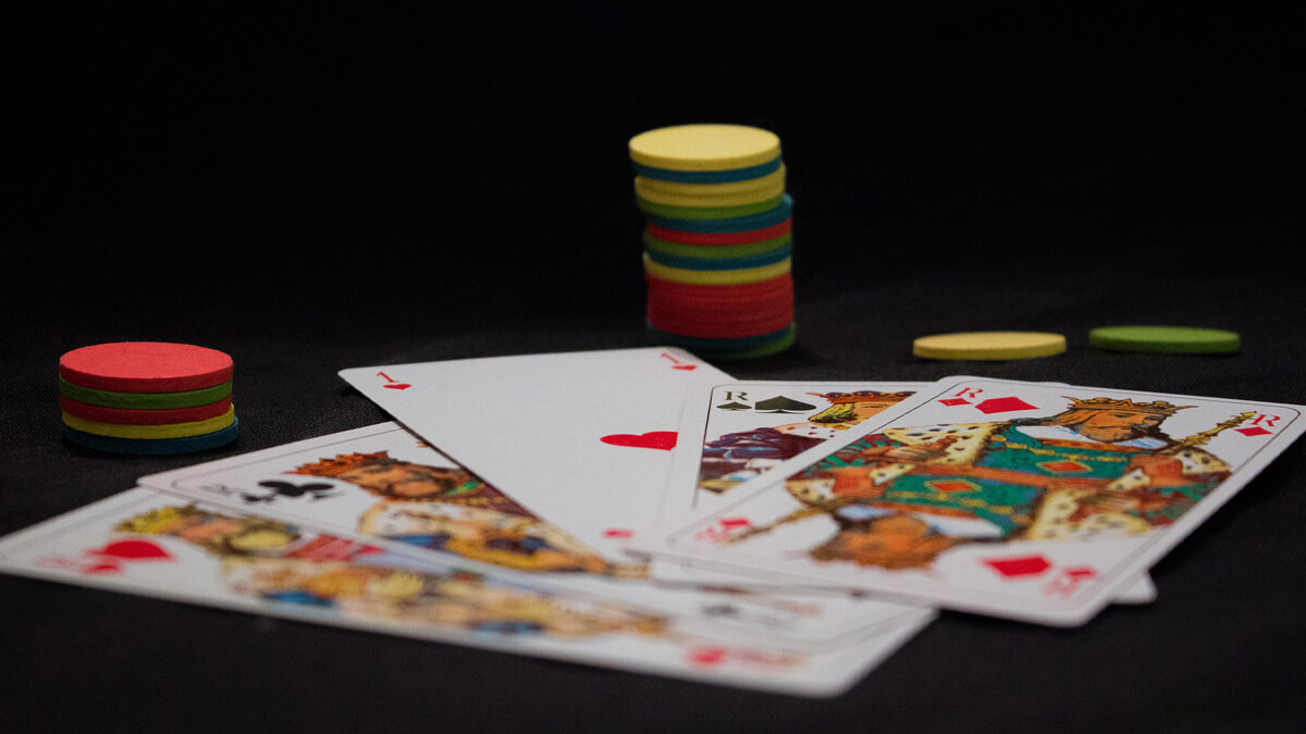 Poker Cards Laid Out, Stacked Casino Chips