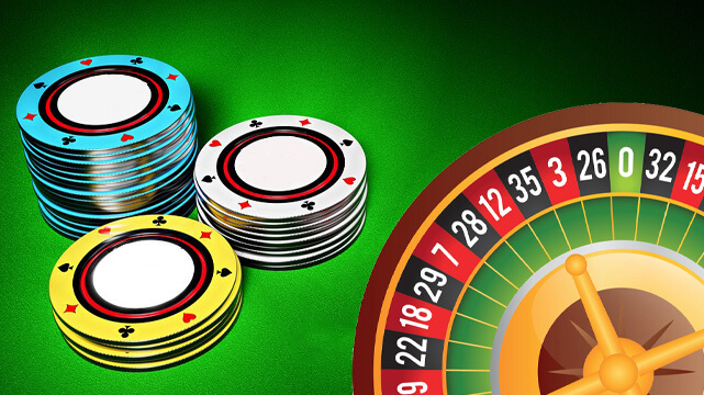 Colored Casino Chips Stacked, Roulette Wheel