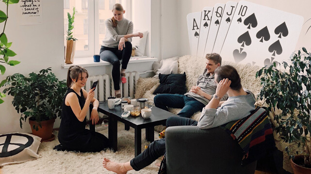 Group of Friends in Living Room, Poker Cards Spread