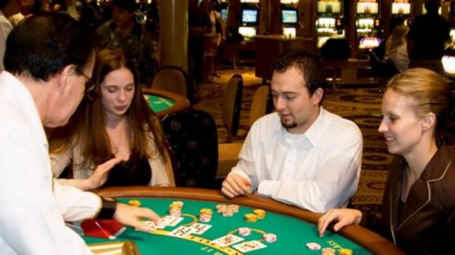 Blackjack Players Seated at a Blackjack Table