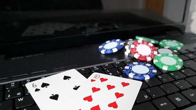 Cards and Chips on a Laptop Keyboard