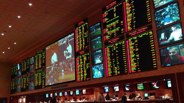 A Sportsbook with Multiple Monitors Showing Games