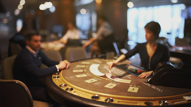 Blackjack Table With Dealer and Players