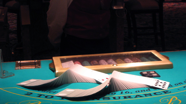 Casino Cards Laid Decoratively on a Blackjack Table