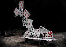 Poker Cards Falling onto Table
