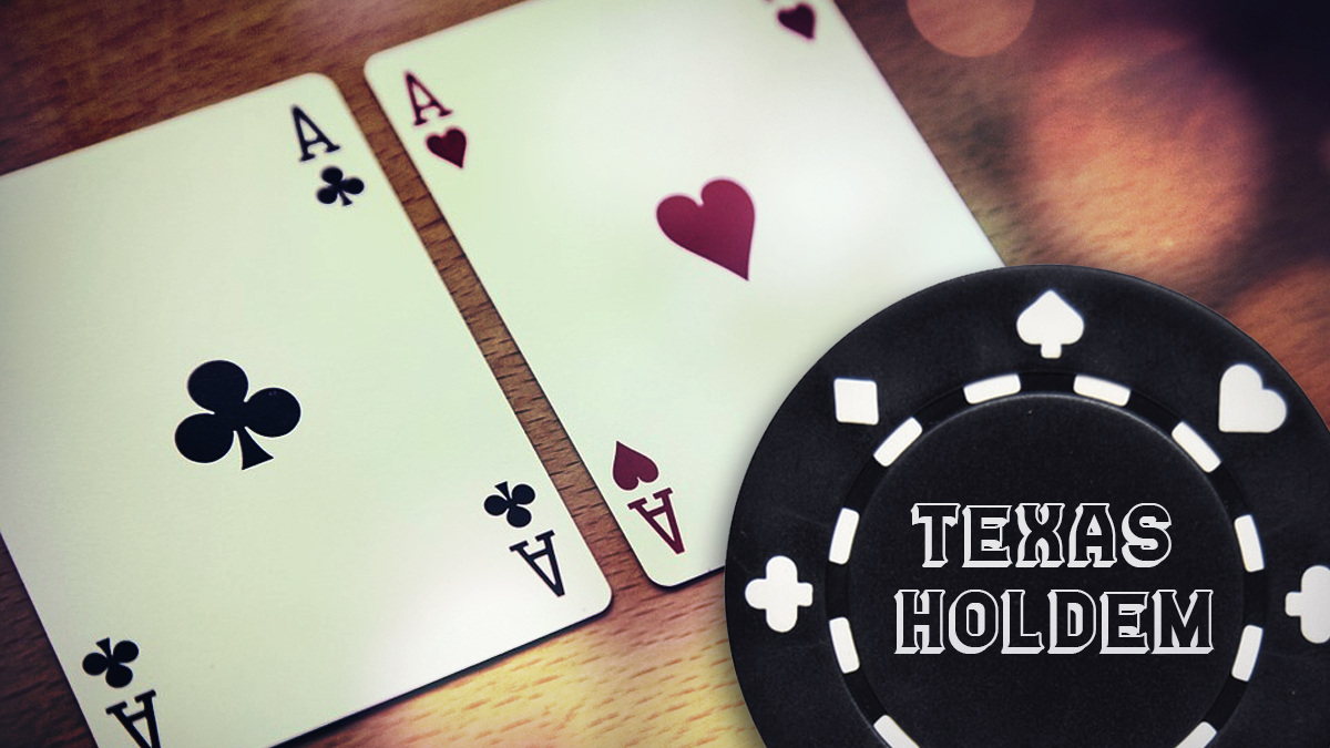 Black Poker Chip That Reads "Texas Holdem" With Pair of Aces in Background
