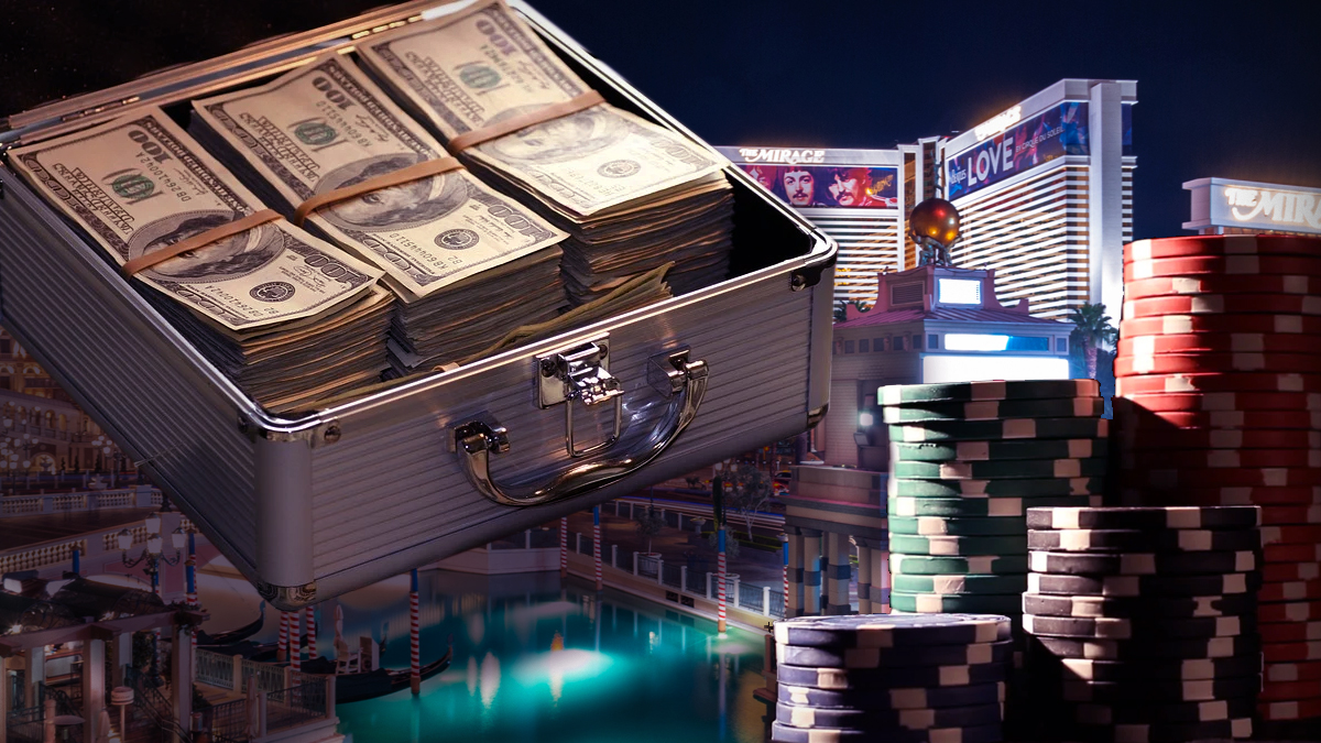Case of Money Next to Casino Chips With Las Vegas Strip Background