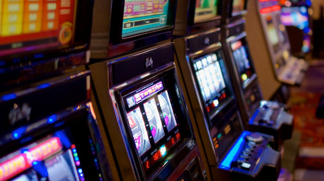 Closeup of Row of Slot Machines