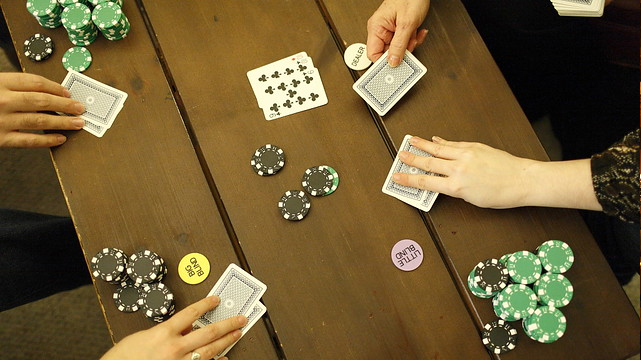 Poker Game on a Wooden Table