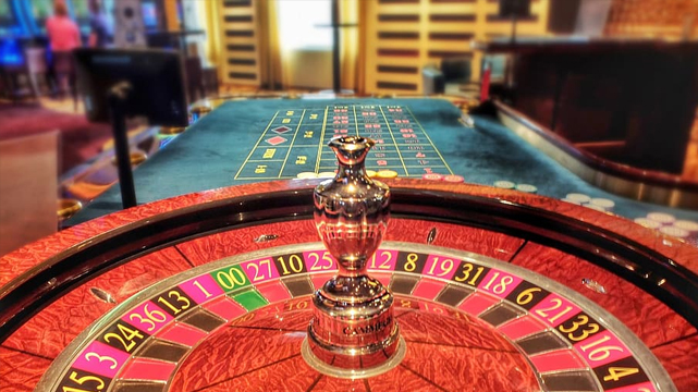 Long Closeup View of Roulette Wheel and Table