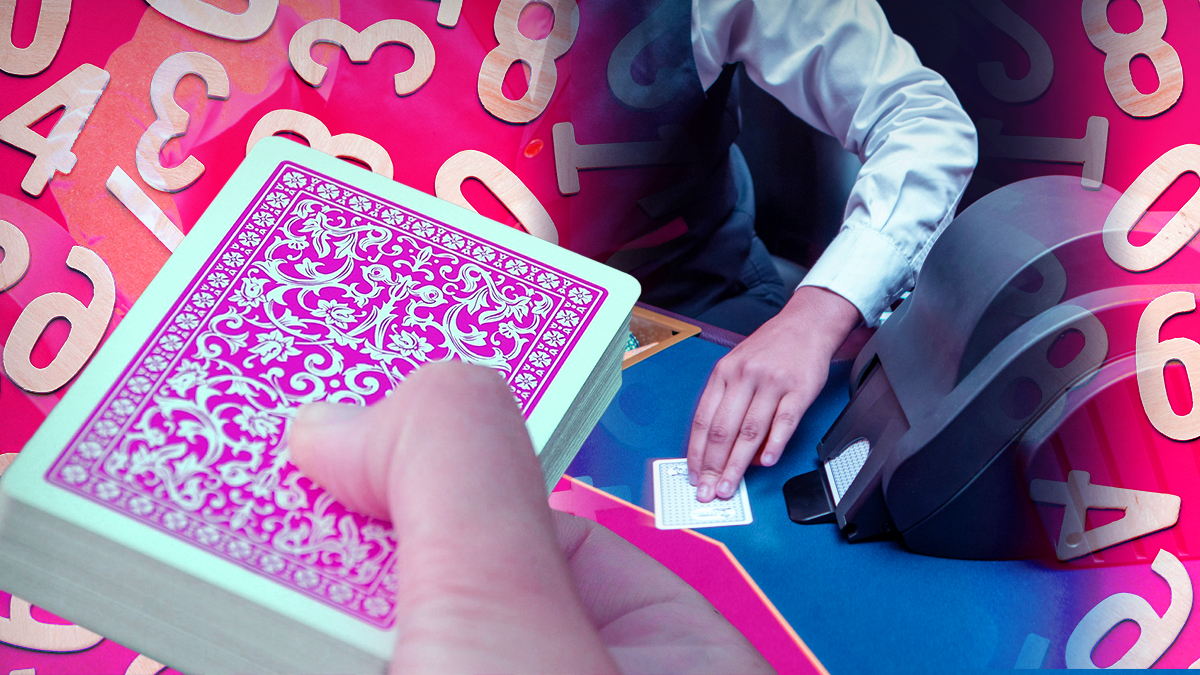 Hand Holding a Deck of Cards With a Card Shuffling Machine Background