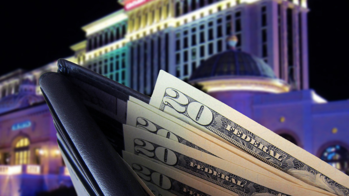 Open Wallet Full of 20 Dollar Bills With Las Vegas Resort Background