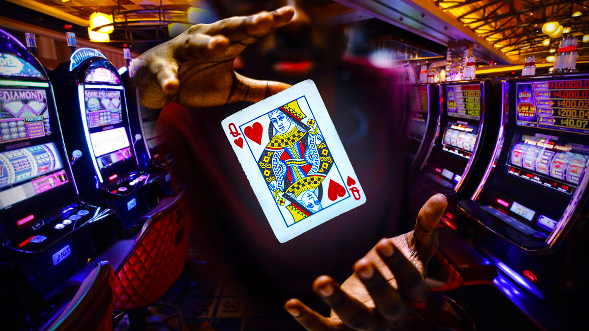Man Floating a Playing Card in Between His Hands
