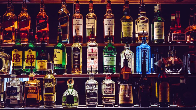 Bar Shelf Full of Liquor Bottles