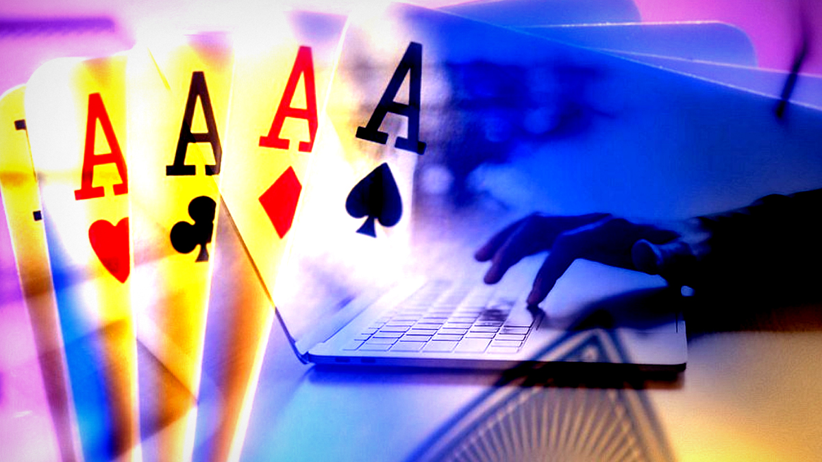 Aces Playing Cards and a Closeup of a Hand on a Laptop