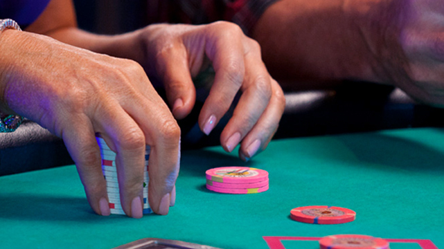 Closeup of a Blackjack Player Holding Their Chips