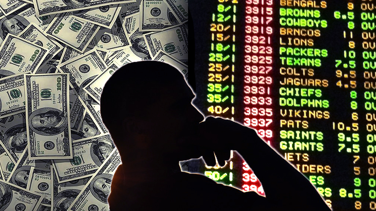 Silhouette of a Man Thinking With a Sportsbook and Cash Background