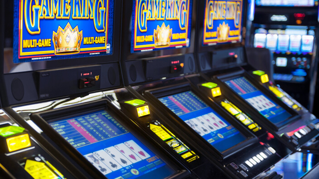 Row of Game King Video Poker Machines