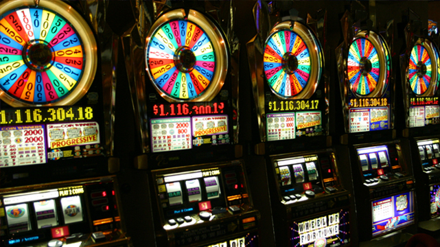 Row of Wheel of Fortune Slot Machines