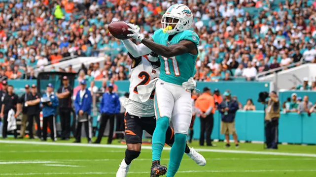 NFL Dolphins Player Catching a Pass