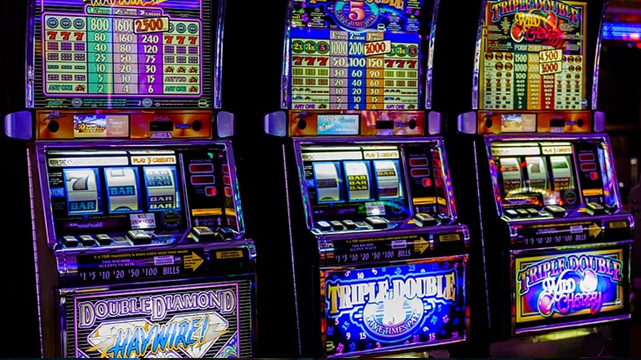 Row of Various Slot Machines