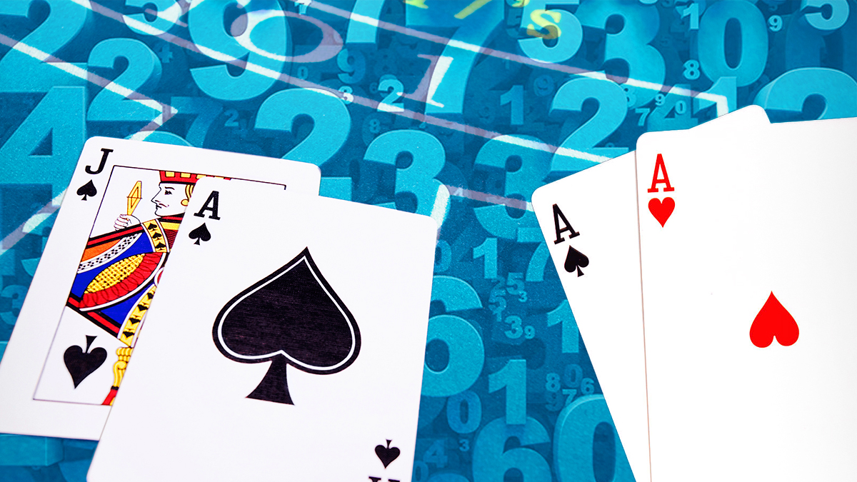 Blackjack and Aces Pair With a Numbers Background
