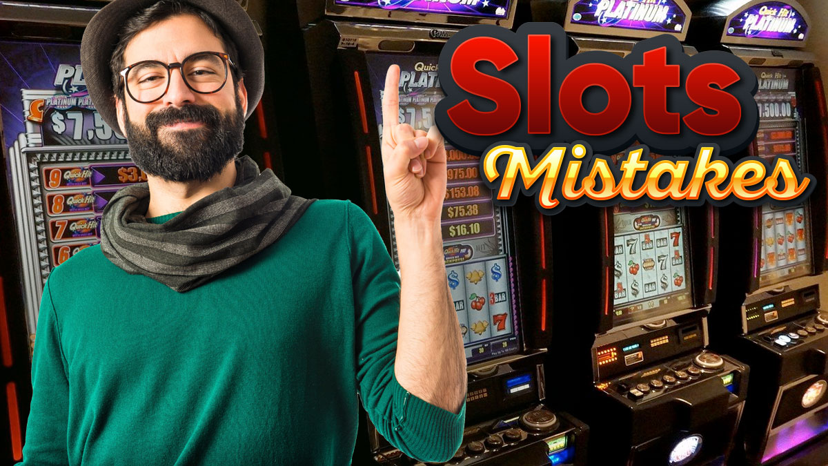 Man Holding a Finger up With a Row of Slot Machines Behind Him