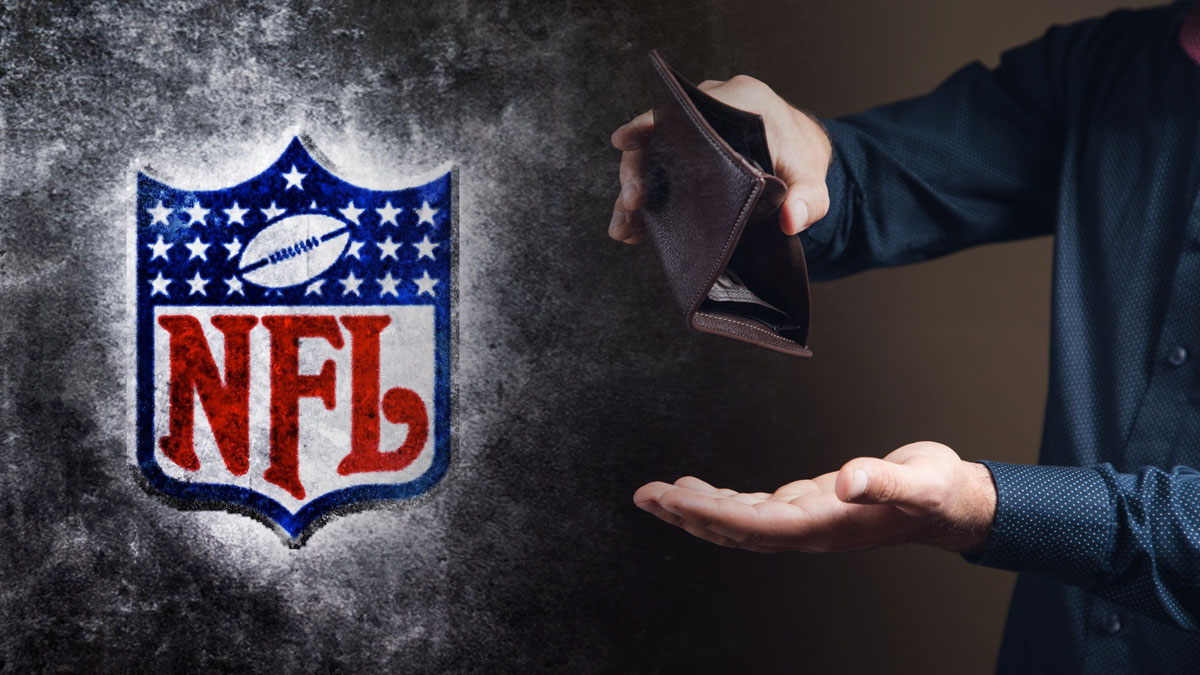 Man Holding a Wallet Upside Down With an NFL Logo on Left