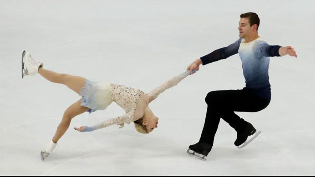 Pair of Figure Skaters on the Ice