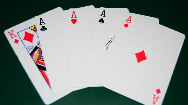 Four of a Kind Poker Hand on Poker Table