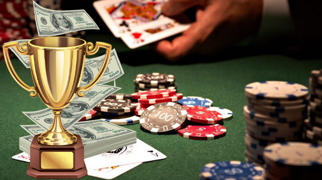 Poker Table with Casino Chips and Poker Cards, Gold Trophy, Stack of Money with Bills Flying Up