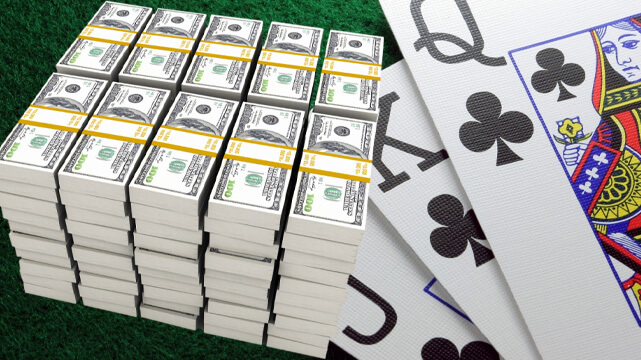 Stacks of Money, Casino Poker Cards Spread Out