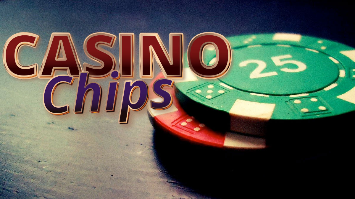 Closeup of Two Casino Chips on a Table